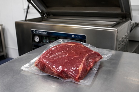 Meat vacuum packaging in chamber machine
